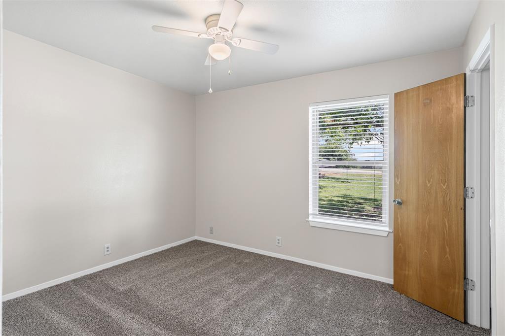 1221 East Fm 4 Cleburne, TX 76031 - Photo 19 of 35 an empty room with a window