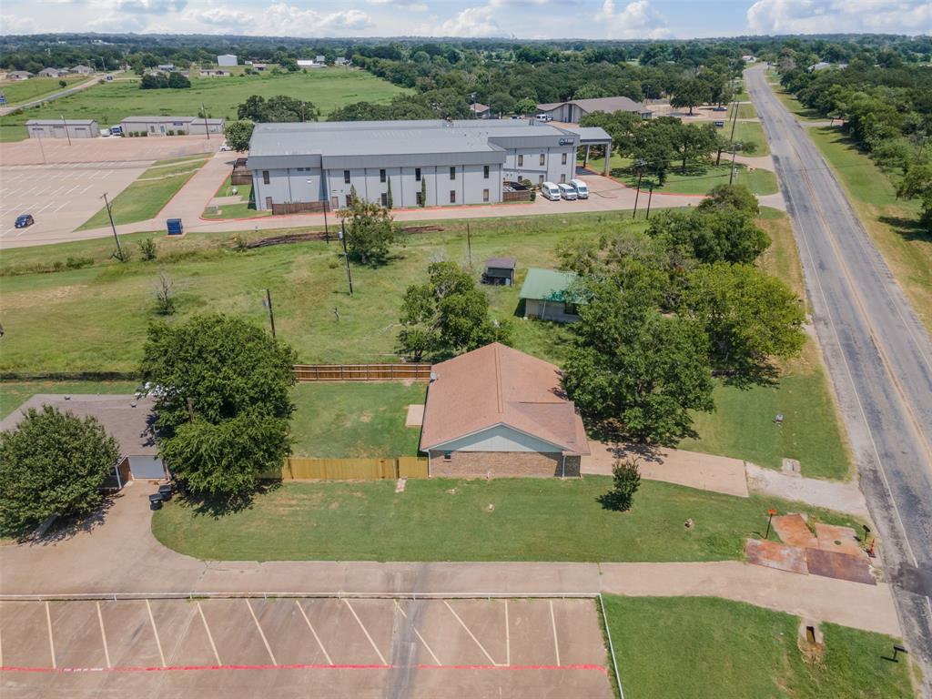 1221 East Fm 4 Cleburne, TX 76031 - Photo 35 of 35 an aerial view of a house with a yard