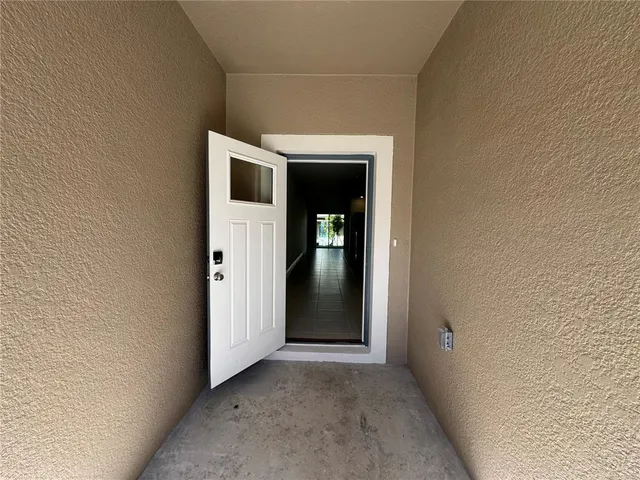 a view of livingroom with kitchen