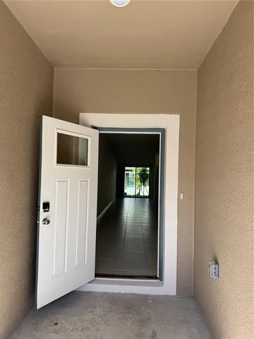 a kitchen with stainless steel appliances granite countertop a stove sink and cabinets