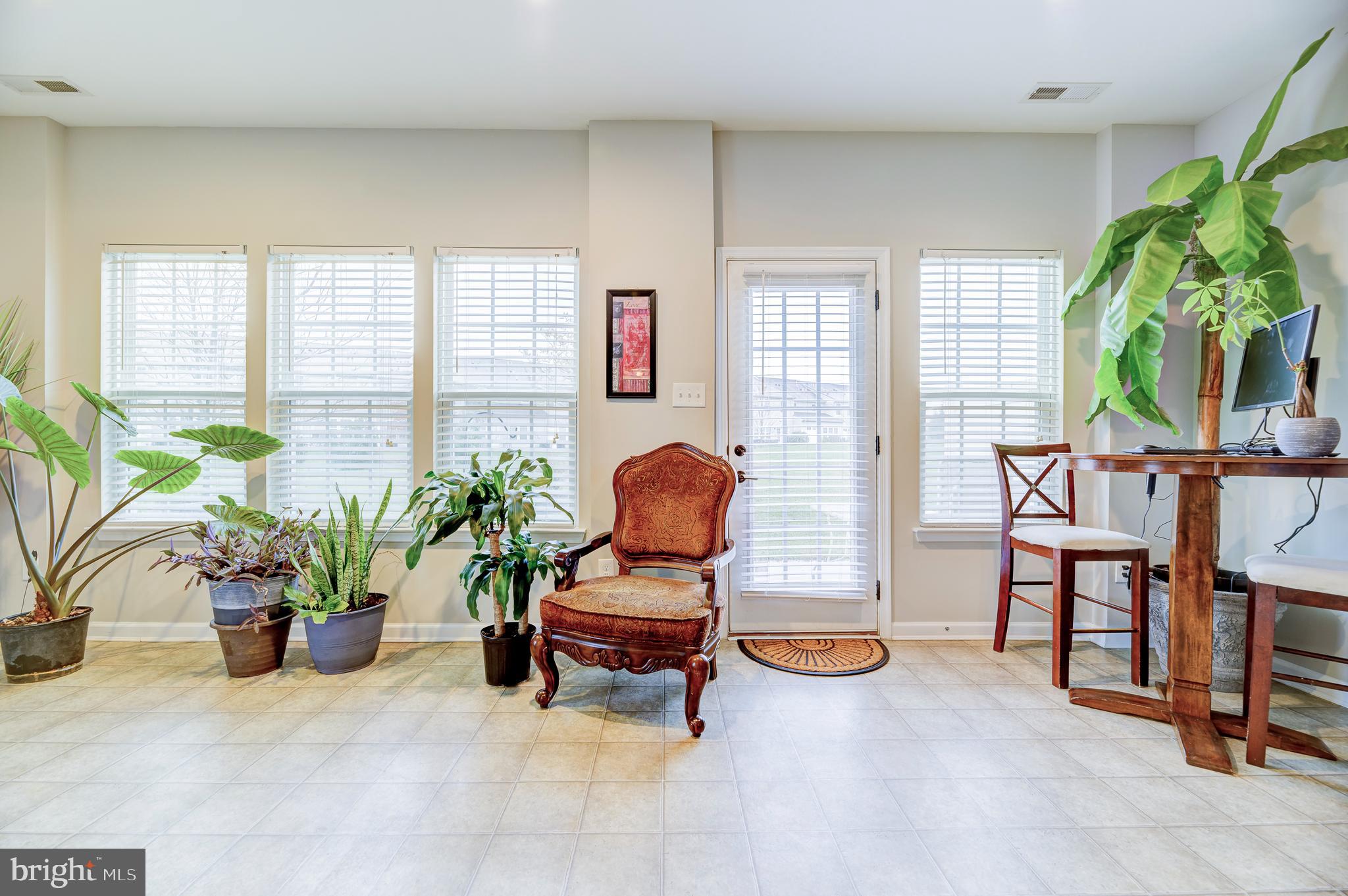 81 Sundance Drive Hamilton, NJ 08619 - Photo 18 of 44 a living room with furniture and a potted plant