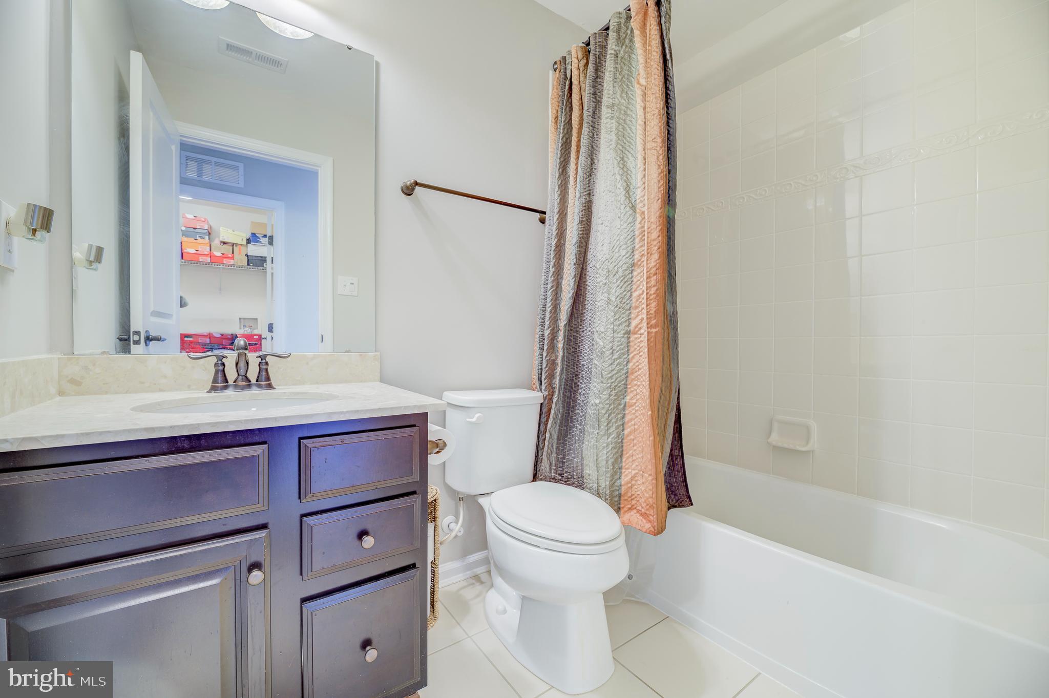 81 Sundance Drive Hamilton, NJ 08619 - Photo 21 of 44 a bathroom with a sink toilet and shower