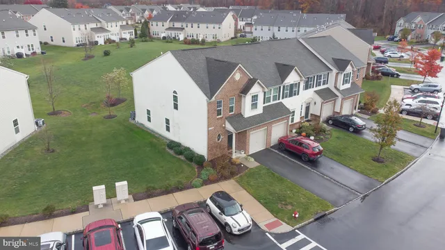 an aerial view of a house with garden