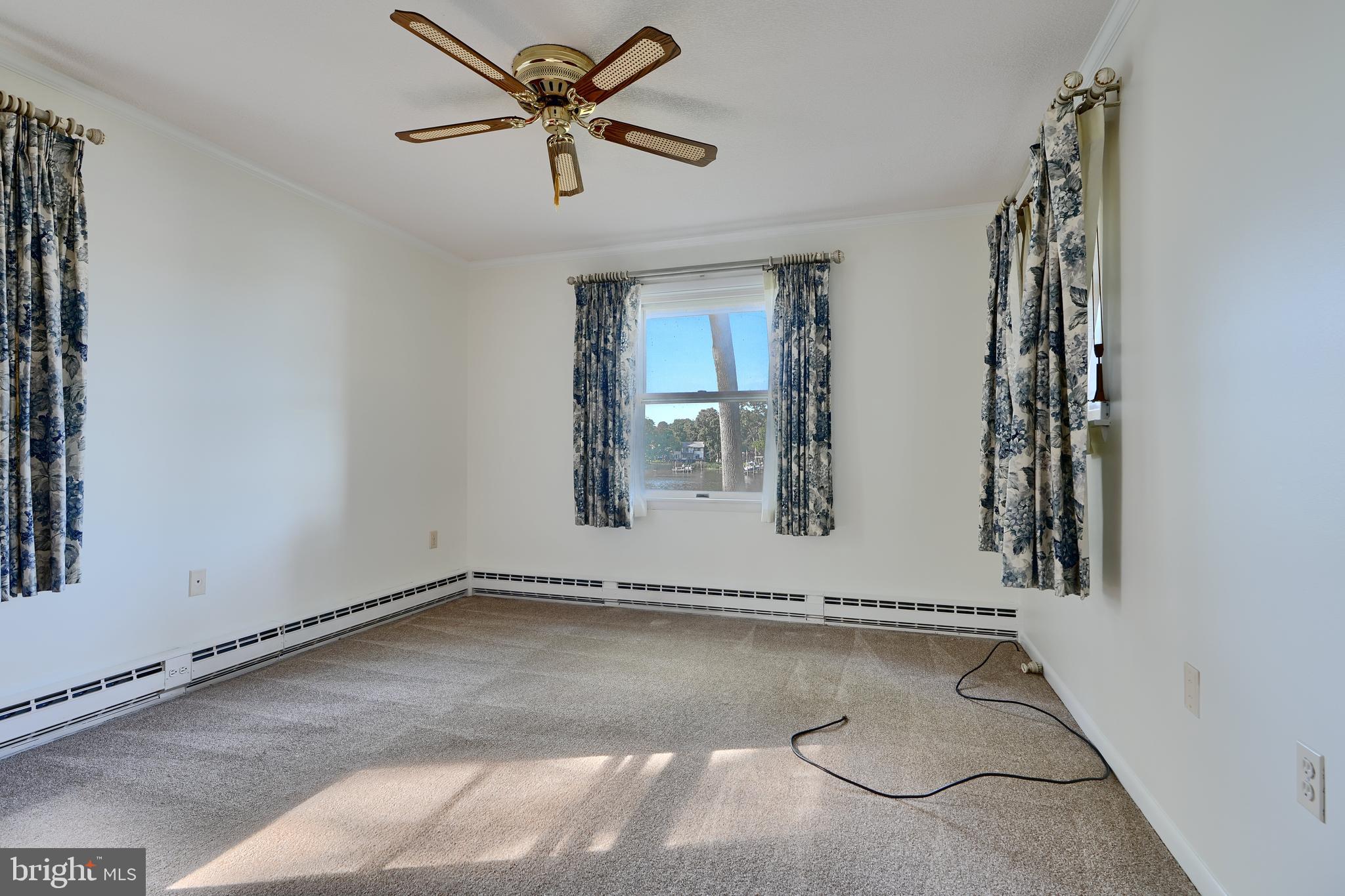 1924 Cedar Road Pasadena, MD 21122 - Photo 13 of 43 a view of a livingroom with a flat screen tv