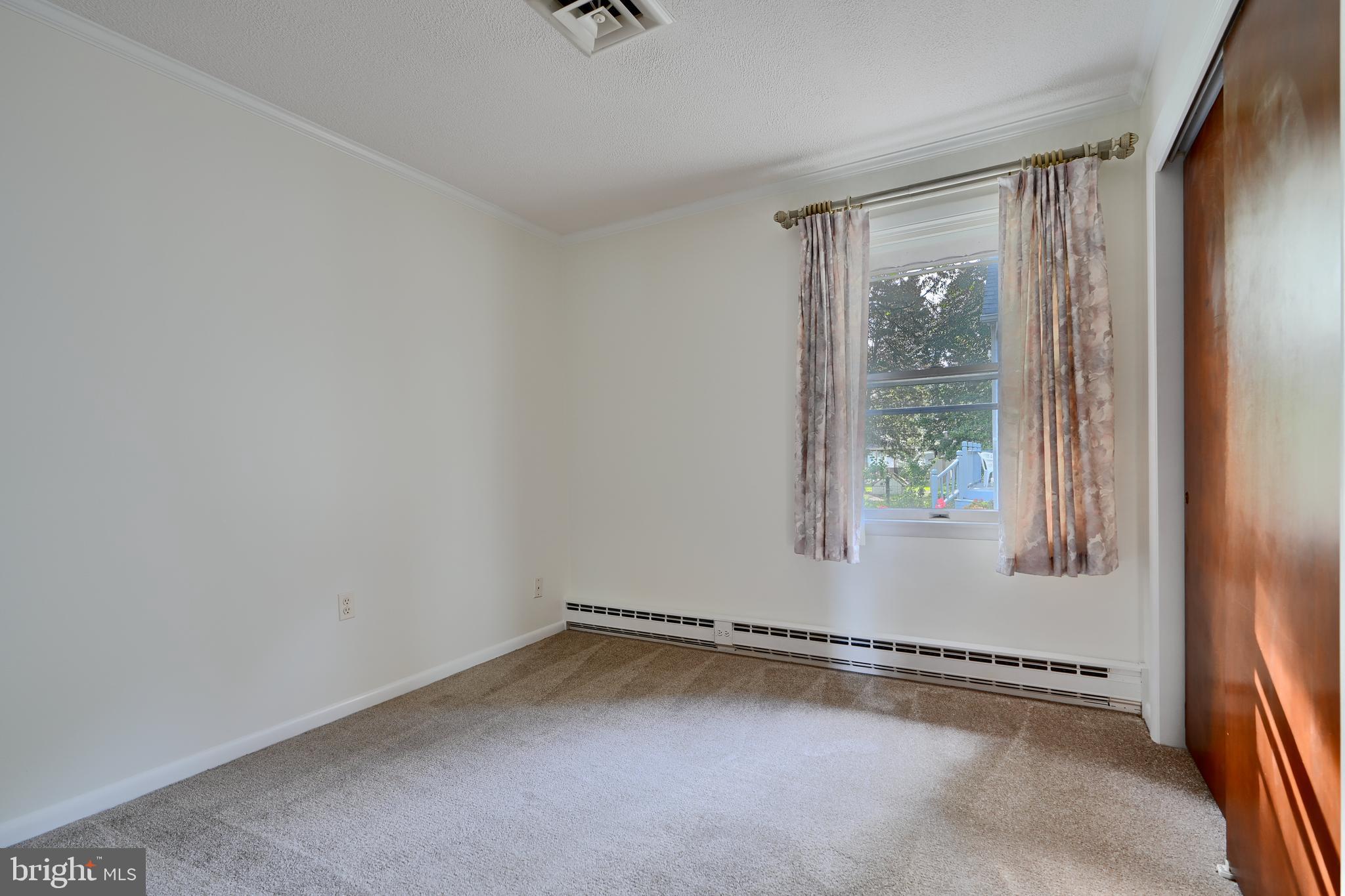 1924 Cedar Road Pasadena, MD 21122 - Photo 15 of 43 a view of a room with window