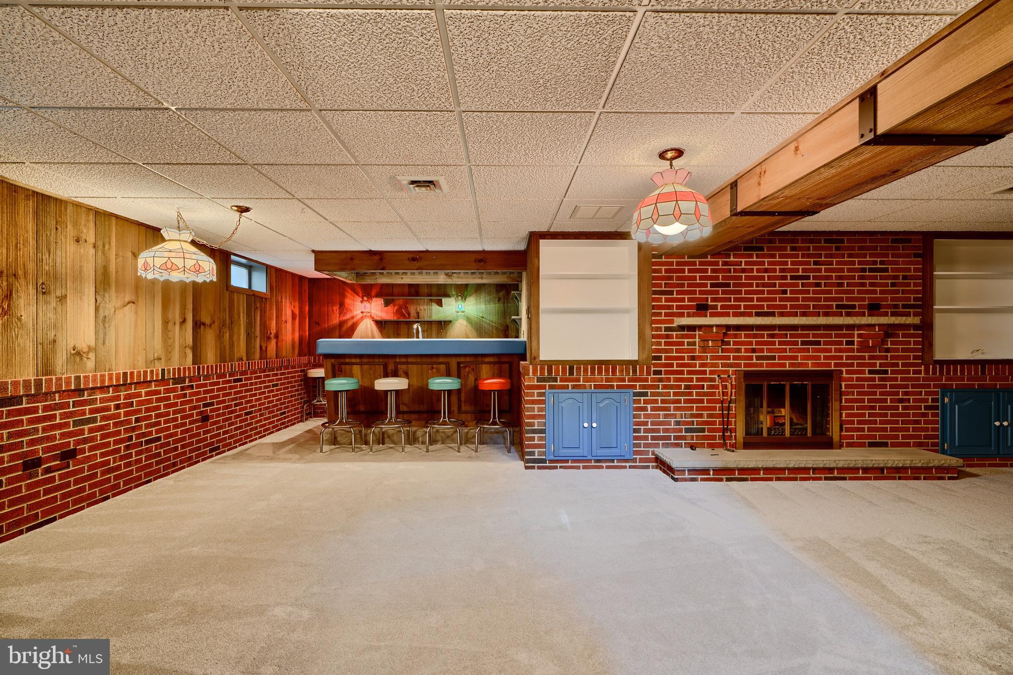 1924 Cedar Road Pasadena, MD 21122 - Photo 21 of 43 a room with fireplace