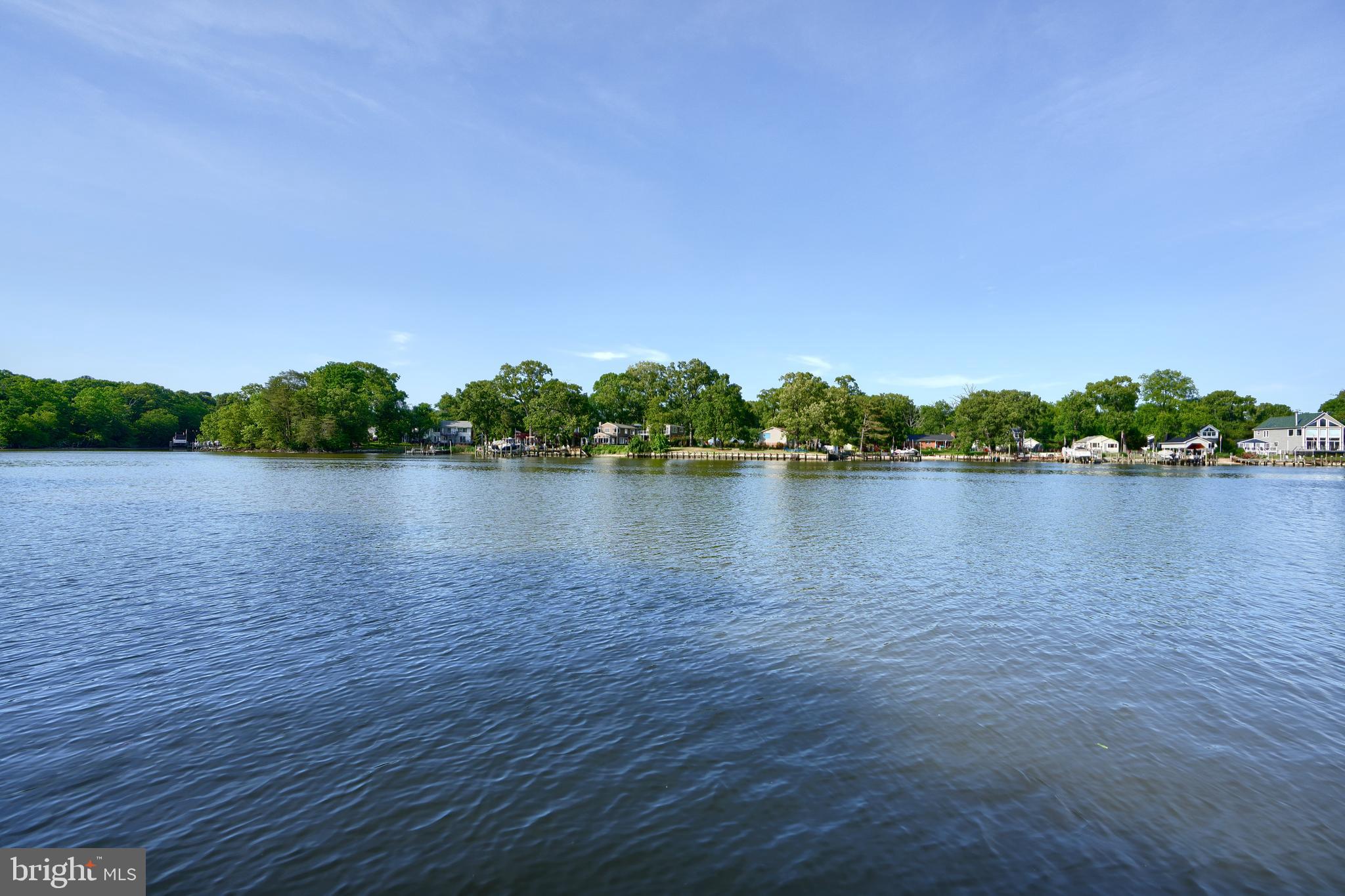 1924 Cedar Road Pasadena, MD 21122 - Photo 37 of 43 a view of a lake with houses in background