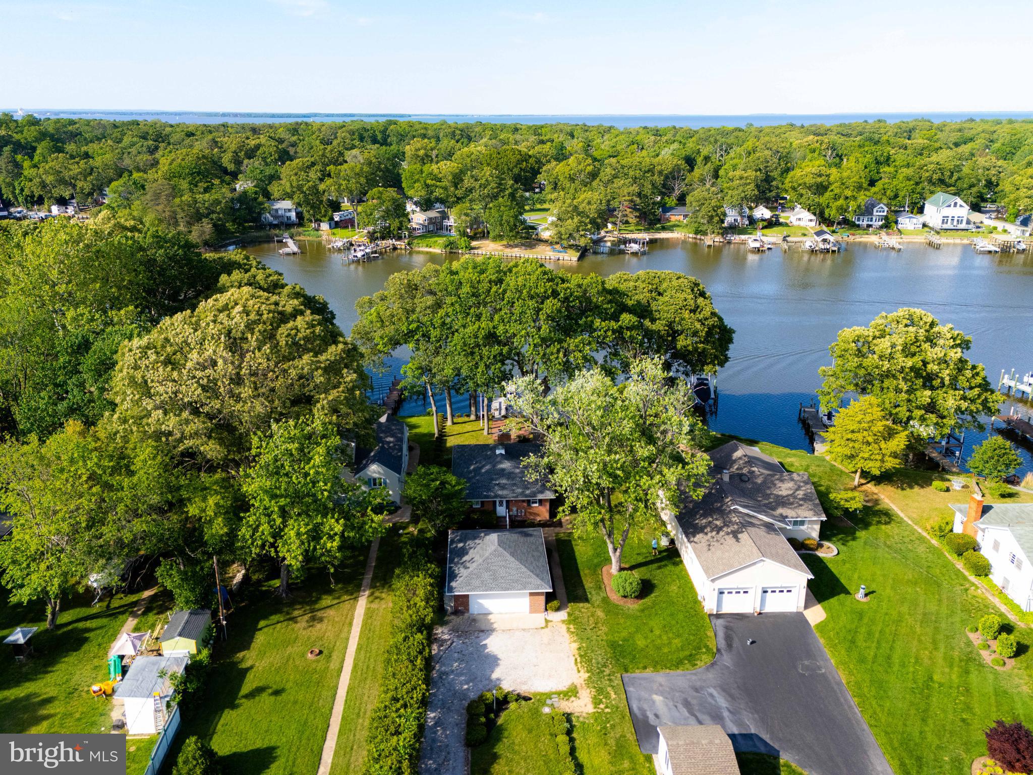 1924 Cedar Road Pasadena, MD 21122 - Photo 41 of 43 an aerial view of residential houses with outdoor space and swimming pool