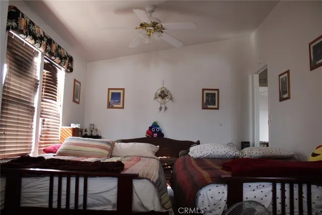 a kitchen with stainless steel appliances a sink cabinets and a refrigerator