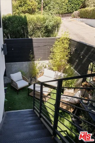 a view of a bench in the patio