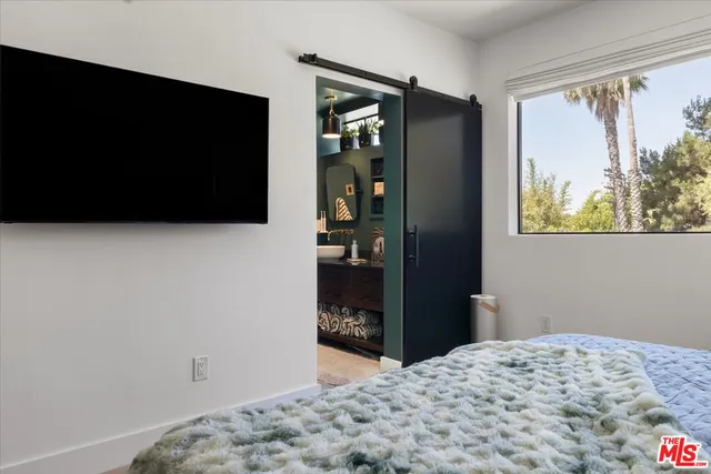 a room with lots of different colored cloths