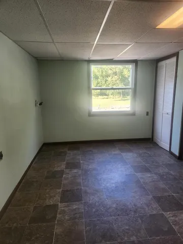 en empty room with windows