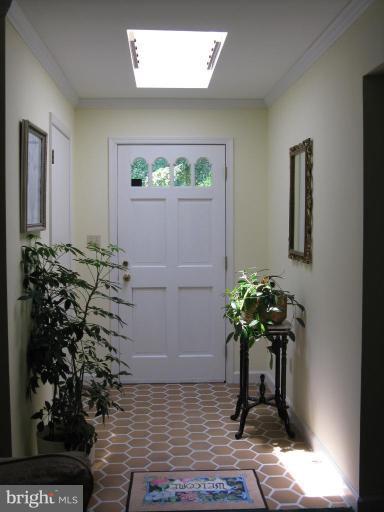 11120 Cove Lake Road Lusby, MD 20657 - Photo 17 of 28 Front door entrance with skylight
