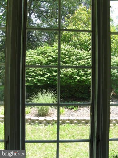 11120 Cove Lake Road Lusby, MD 20657 - Photo 19 of 28 Looking out living room window to backyard