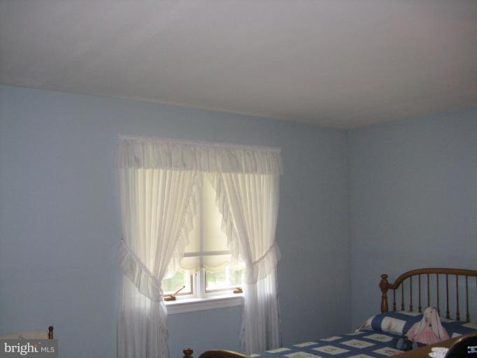 11120 Cove Lake Road Lusby, MD 20657 - Photo 25 of 28 Bedroom #1 window view