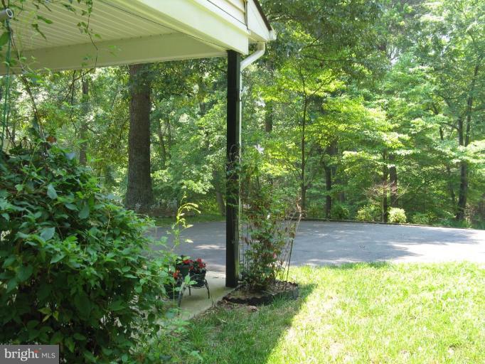 11120 Cove Lake Road Lusby, MD 20657 - Photo 27 of 28 Off of carport- front yard