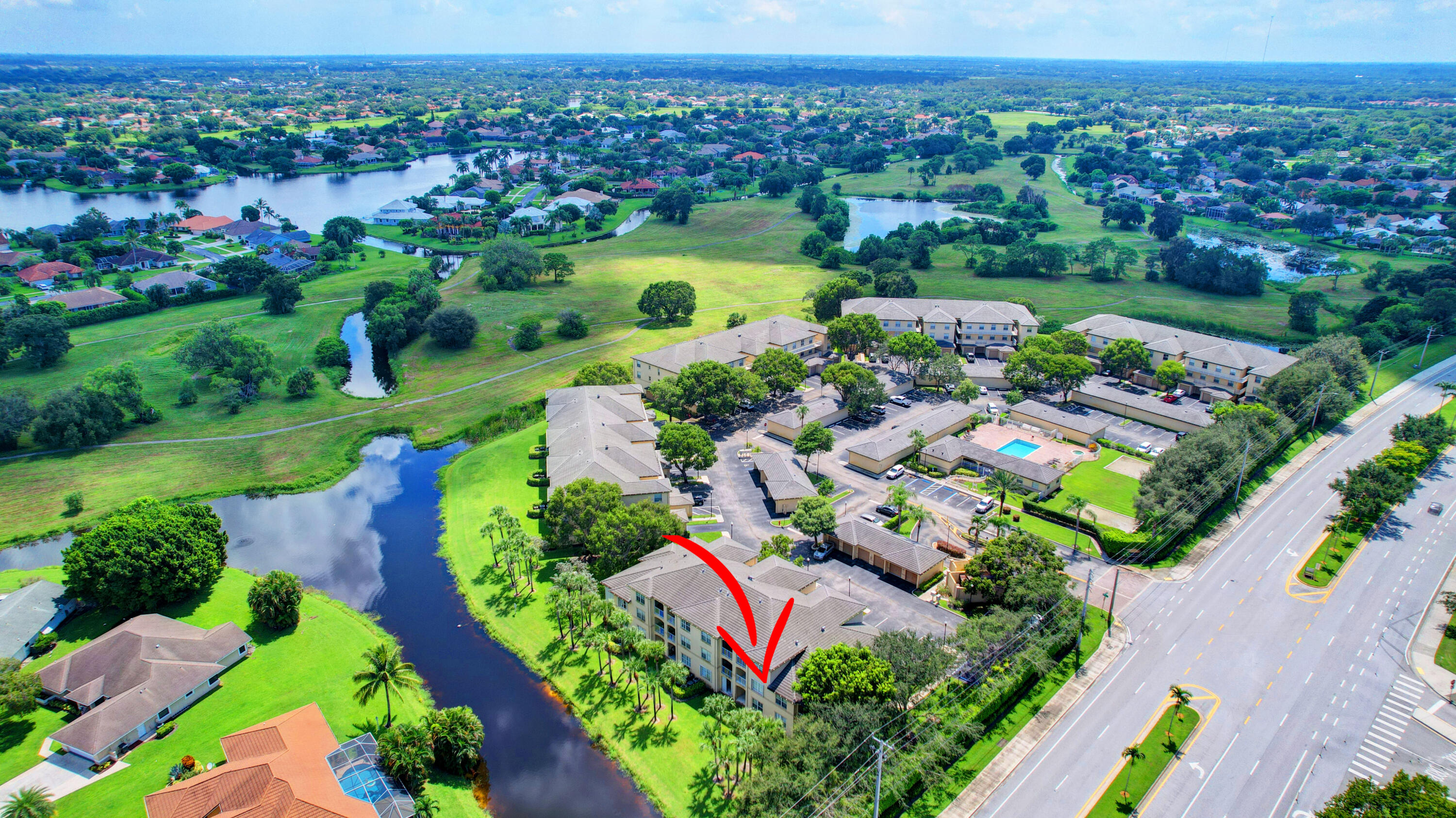 2020 Greenview Shores Boulevard, Unit 108 Wellington, FL 33414 - Photo 2 of 25 an aerial view of a city