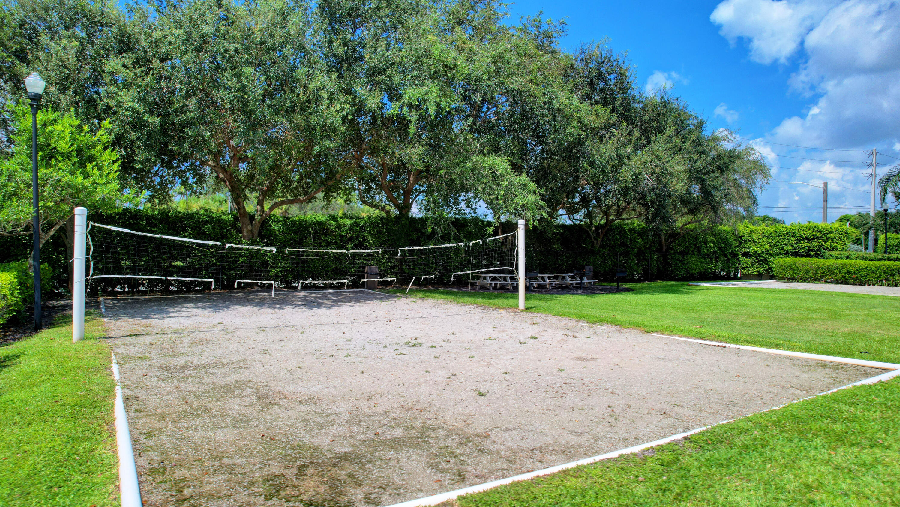 2020 Greenview Shores Boulevard, Unit 108 Wellington, FL 33414 - Photo 22 of 25 a view of backyard with green space