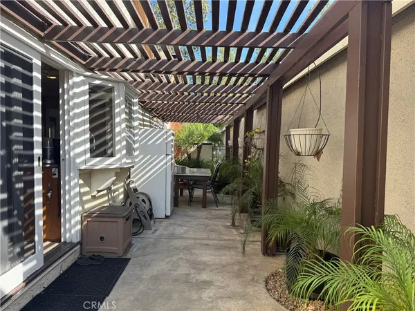 a room with gym equipment and windows