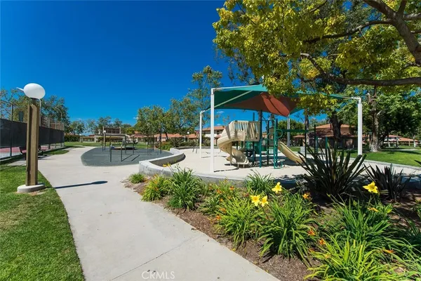 a view of an outdoor space and tennis court