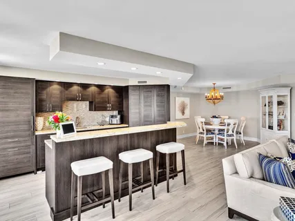 a close view of a sink and a refrigerator