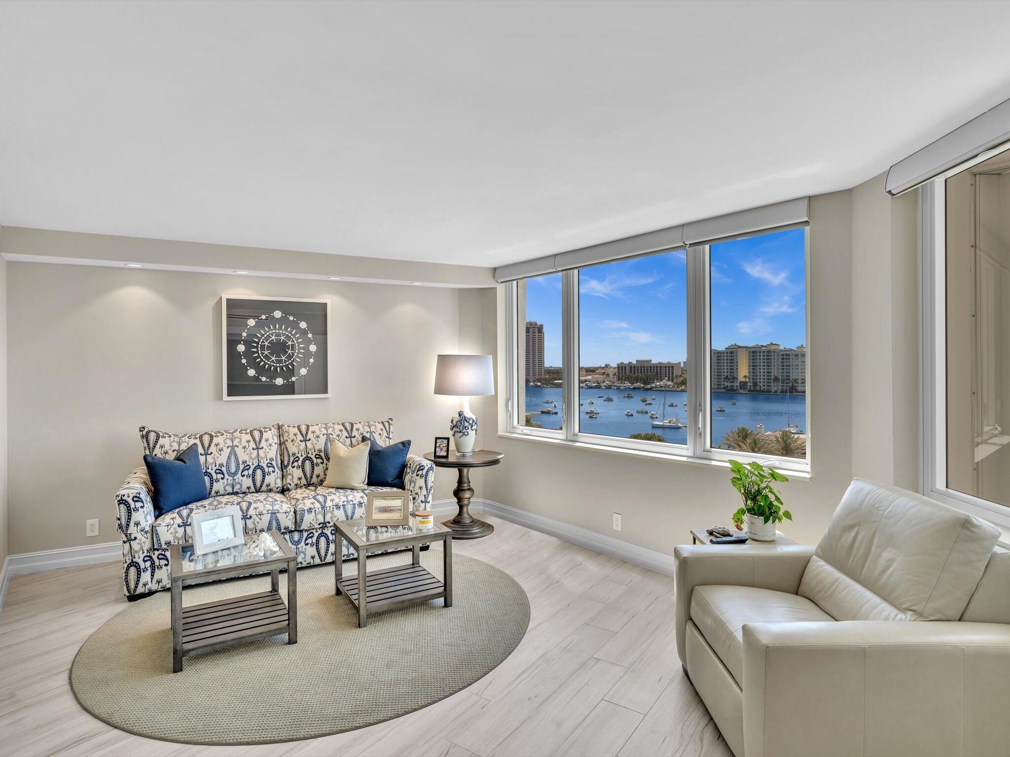 500 South Ocean Boulevard, Unit 909 Boca Raton, FL 33432 - Photo 36 of 101 a living room with furniture and a large window