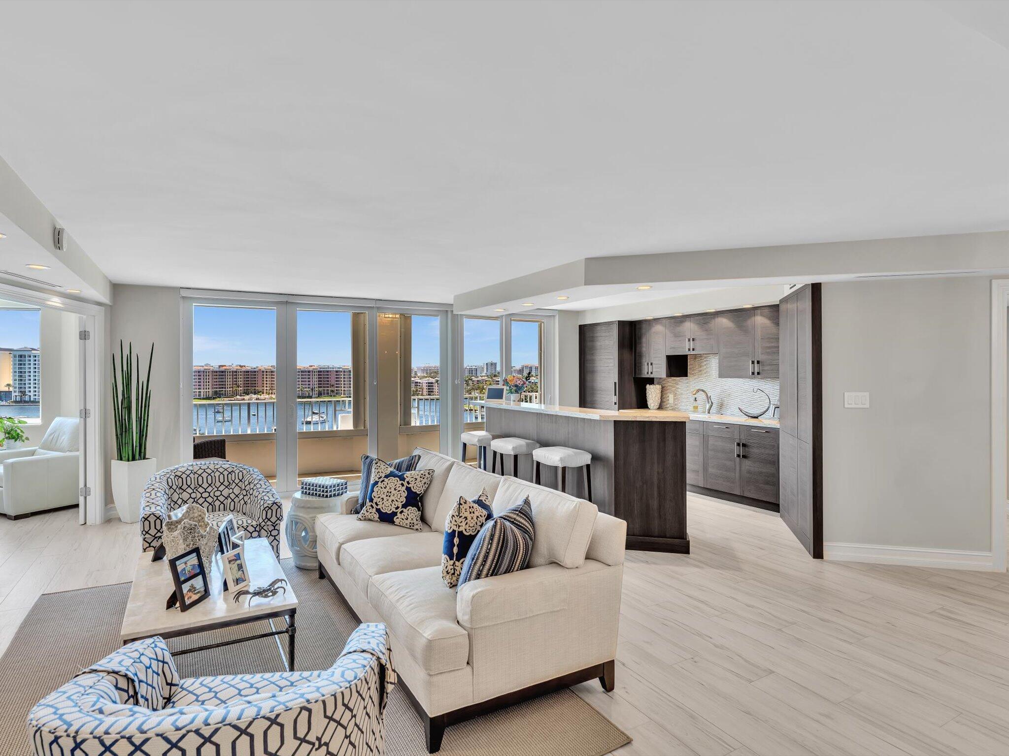 500 South Ocean Boulevard, Unit 909 Boca Raton, FL 33432 - Photo 6 of 101 a living room with furniture and a large window