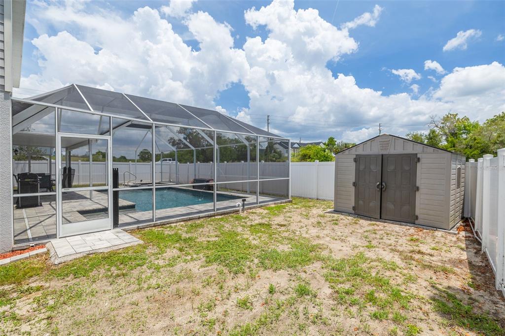 7242 Landmark Drive Spring Hill, FL 34606 - Photo 24 of 45 a view of a backyard