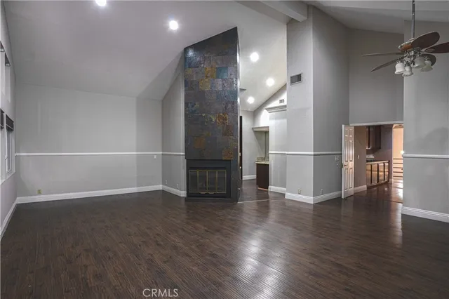 a view of a livingroom with wooden floor