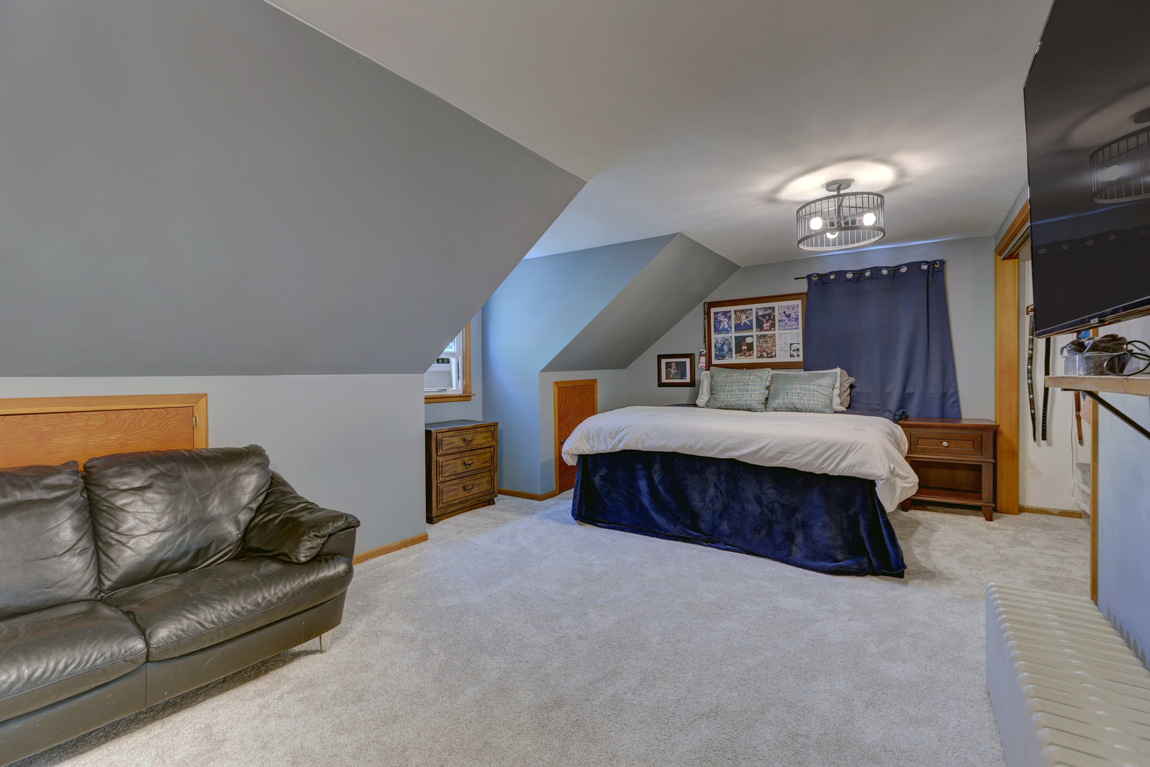 407 West Taylor Road Lombard, IL 60148 - Photo 18 of 33 a bedroom with a large bed a couch and dresser
