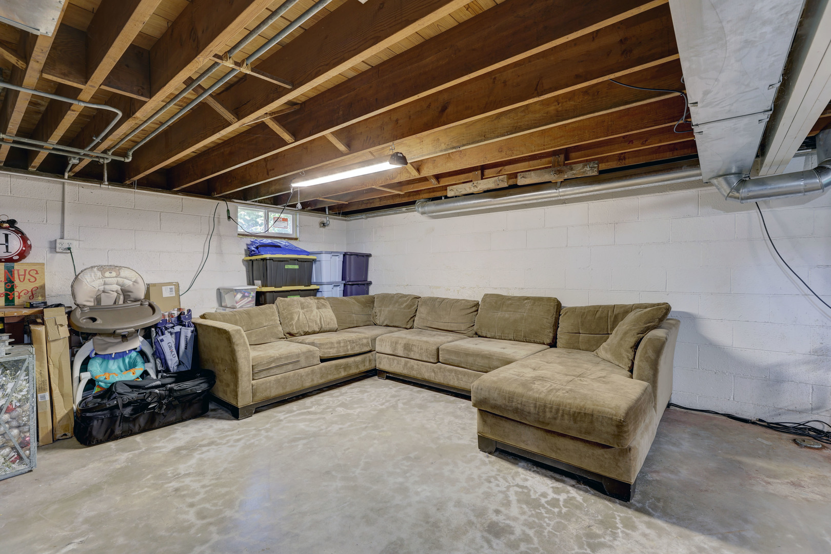 407 West Taylor Road Lombard, IL 60148 - Photo 22 of 33 a living room with furniture a ceiling fan and a window