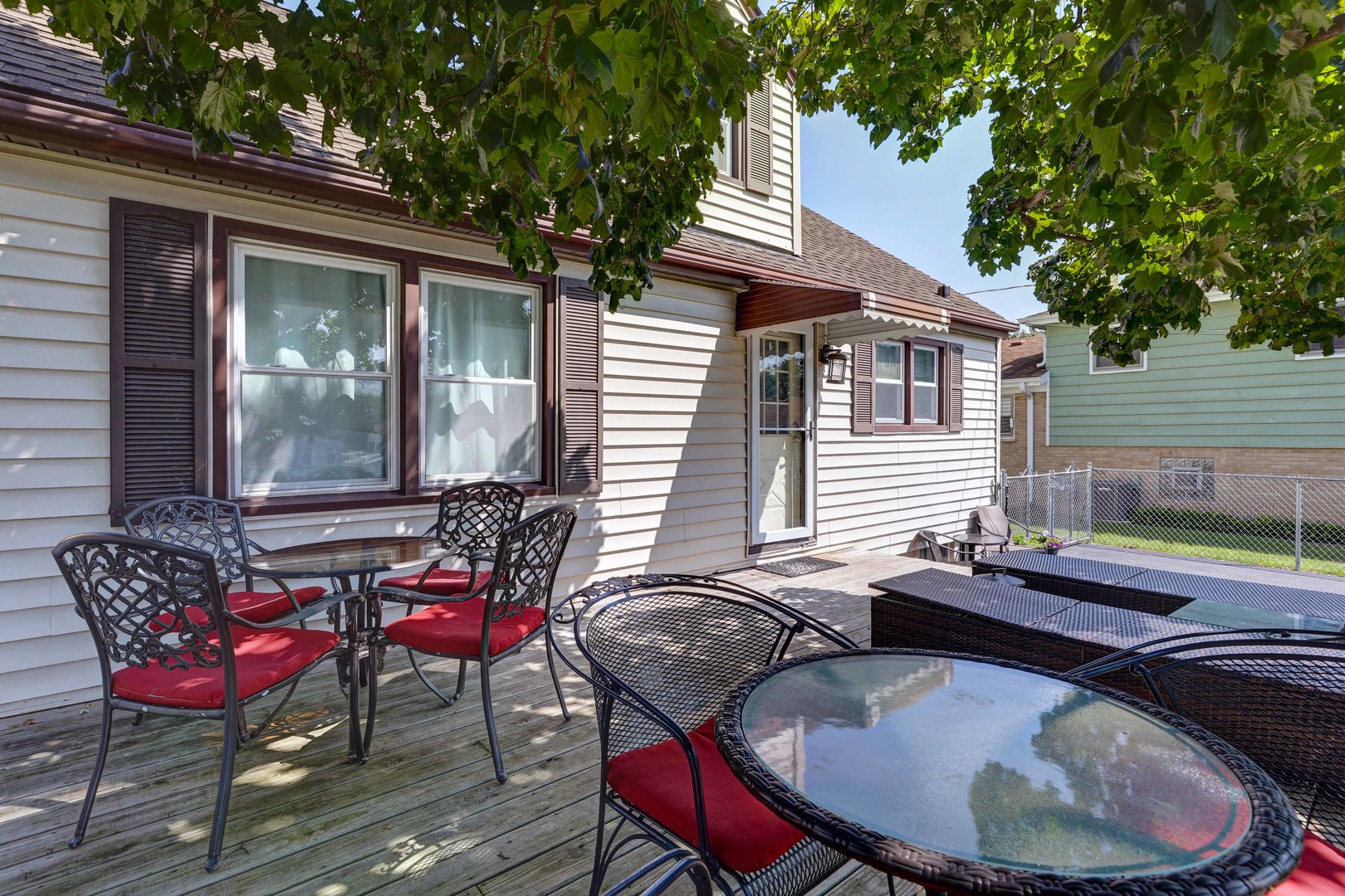 407 West Taylor Road Lombard, IL 60148 - Photo 27 of 33 a backyard of a house with yard table and chairs