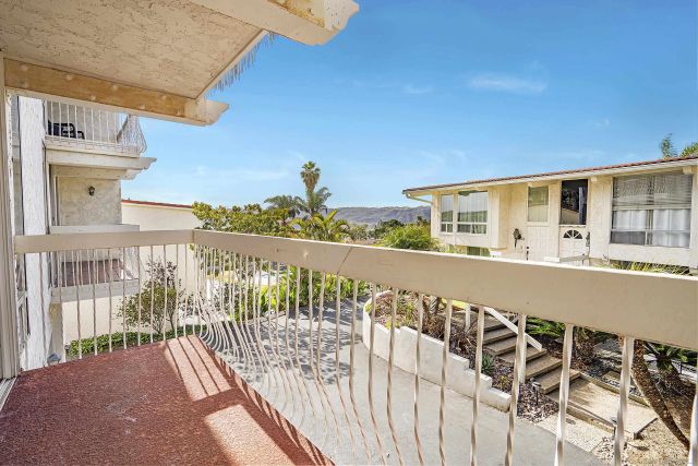 a bathroom with a toilet sink and shower