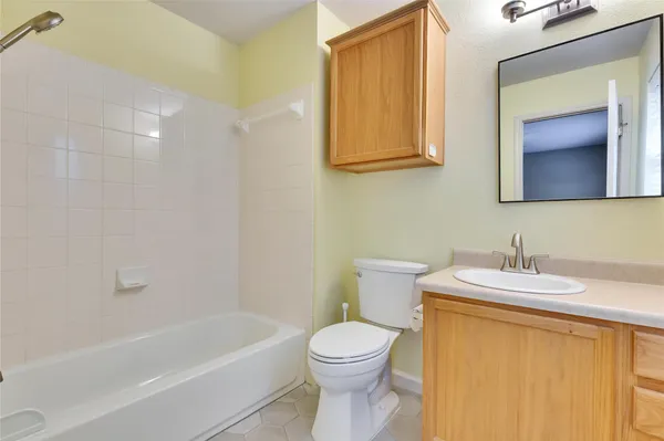 a bathroom with a sink and a toilet