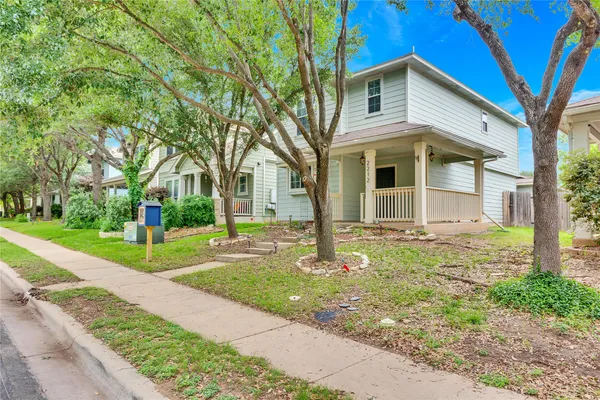 a front view of house with yard