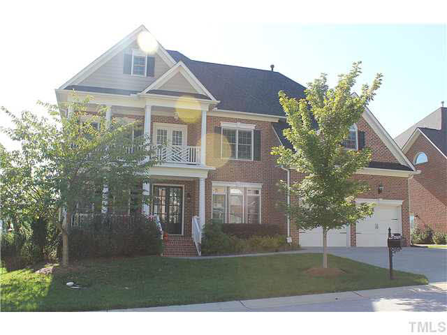 Brick front executive home in River Run.  Covered front porch w/ second floor balcony.