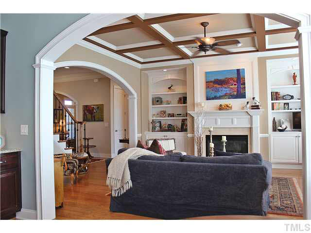 11826 Lowery Ridge Drive Raleigh, NC 27614 - Photo 7 of 25 Gas log fireplace and beautful built in cabinetry in this comfortable family room.