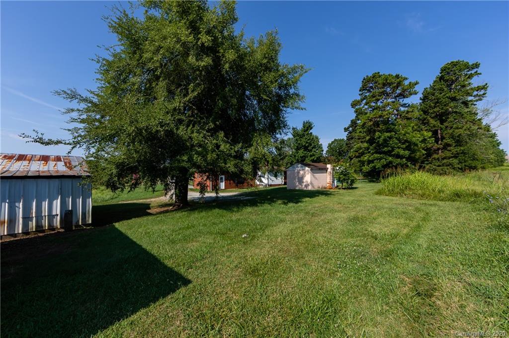 4480 Needmore Road Woodleaf, NC 27054 - Photo 14 of 15 a front view of a house with a yard