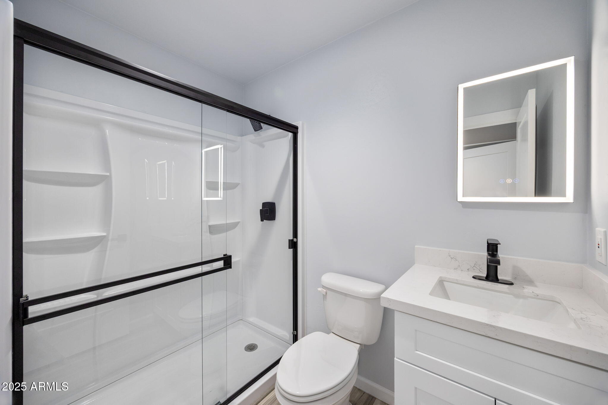 1982 Christmas Pine Road Overgaard, AZ 85933 - Photo 19 of 34 a bathroom with a toilet sink and shower