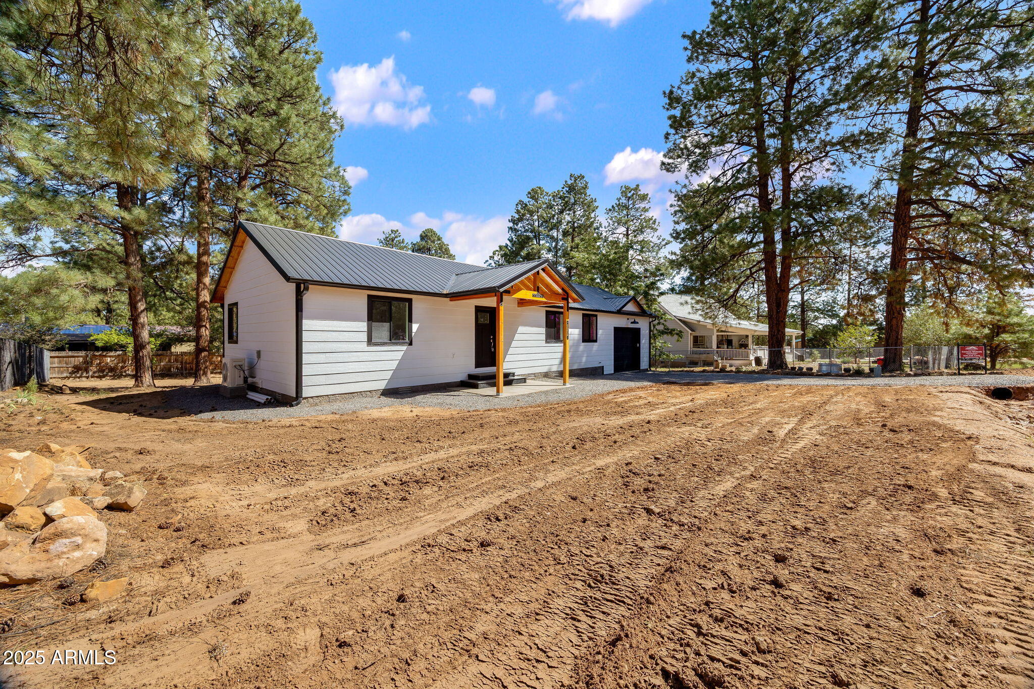 1982 Christmas Pine Road Overgaard, AZ 85933 - Photo 2 of 34 a house view with a outdoor space