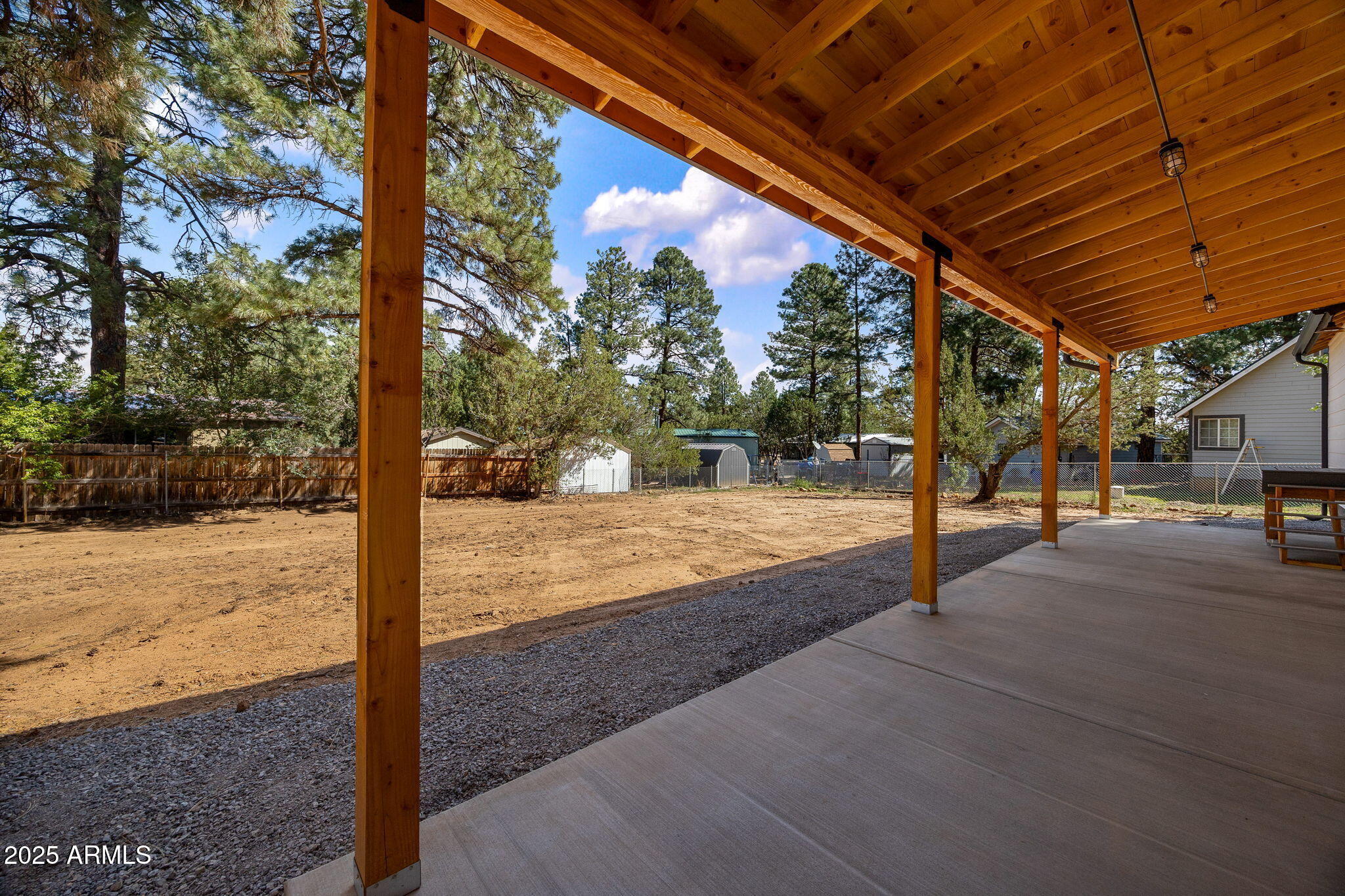 1982 Christmas Pine Road Overgaard, AZ 85933 - Photo 26 of 34 a view of a backyard of the house