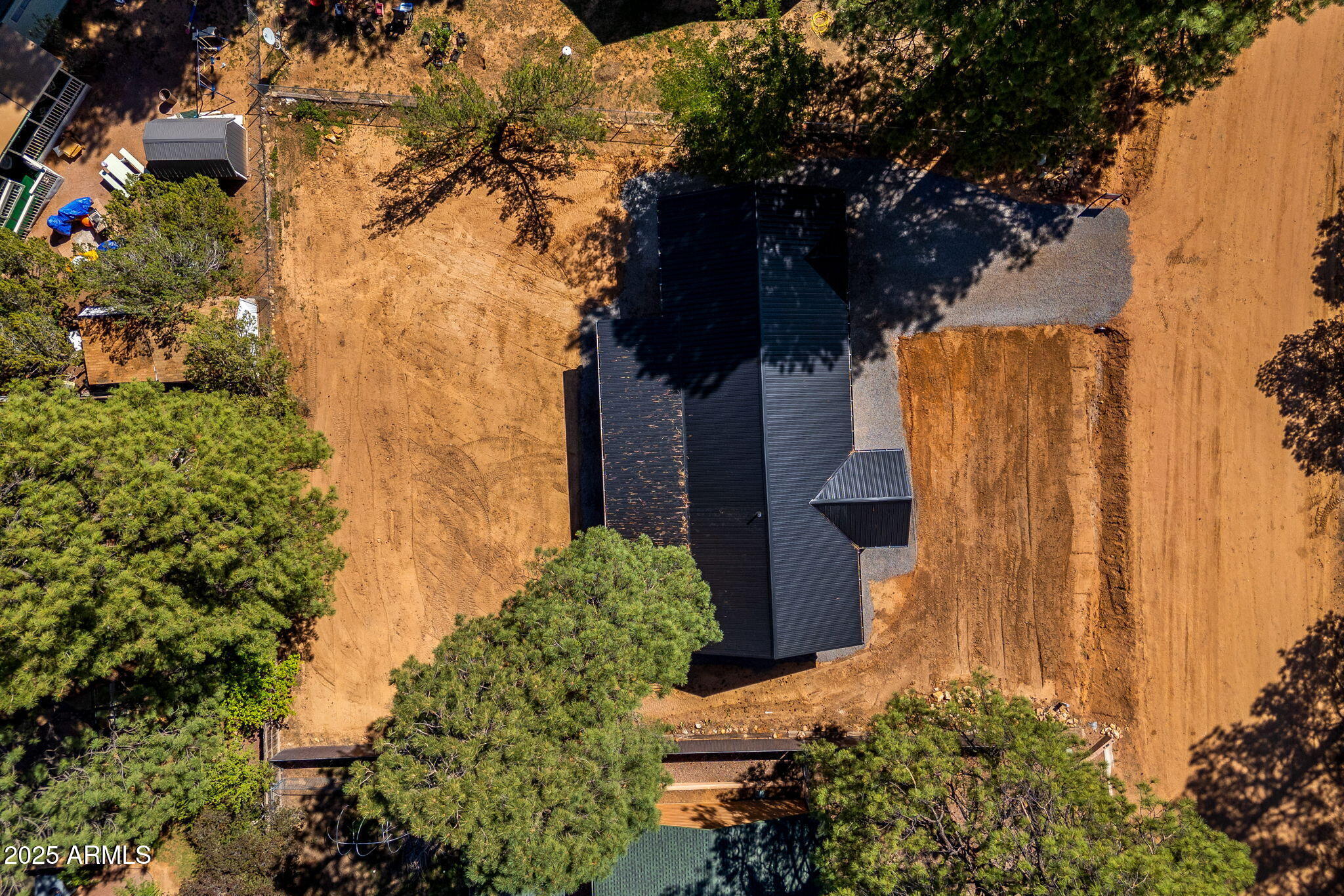 1982 Christmas Pine Road Overgaard, AZ 85933 - Photo 32 of 34 front view of a house with a tree
