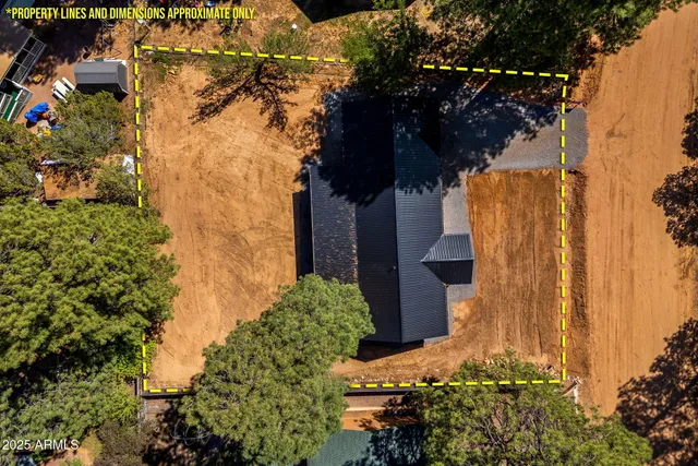 front view of a house with a tree