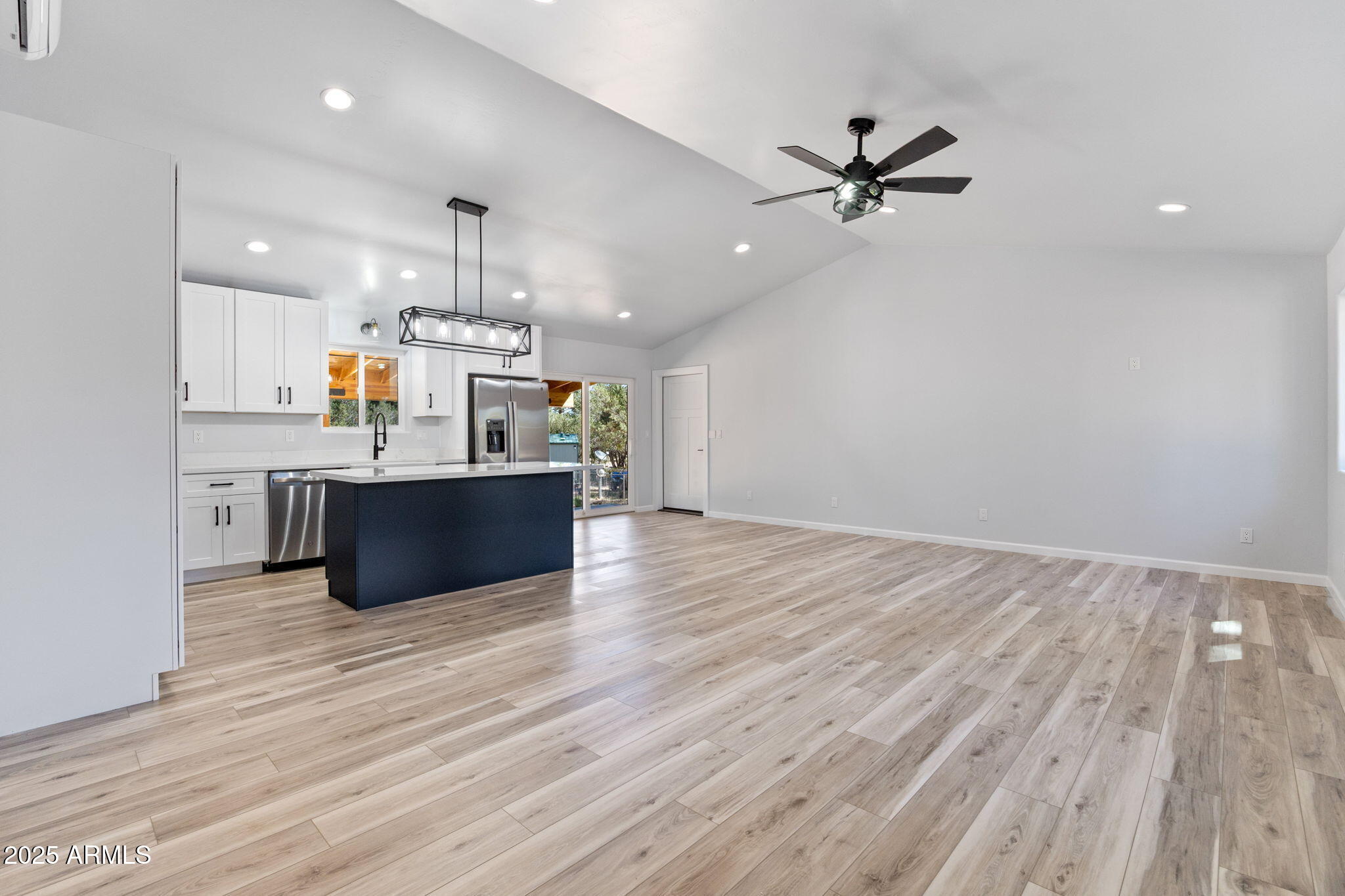 1982 Christmas Pine Road Overgaard, AZ 85933 - Photo 5 of 34 a view of kitchen with wooden floor and window