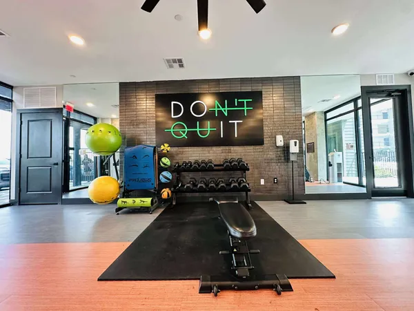 a view of a room with gym equipment