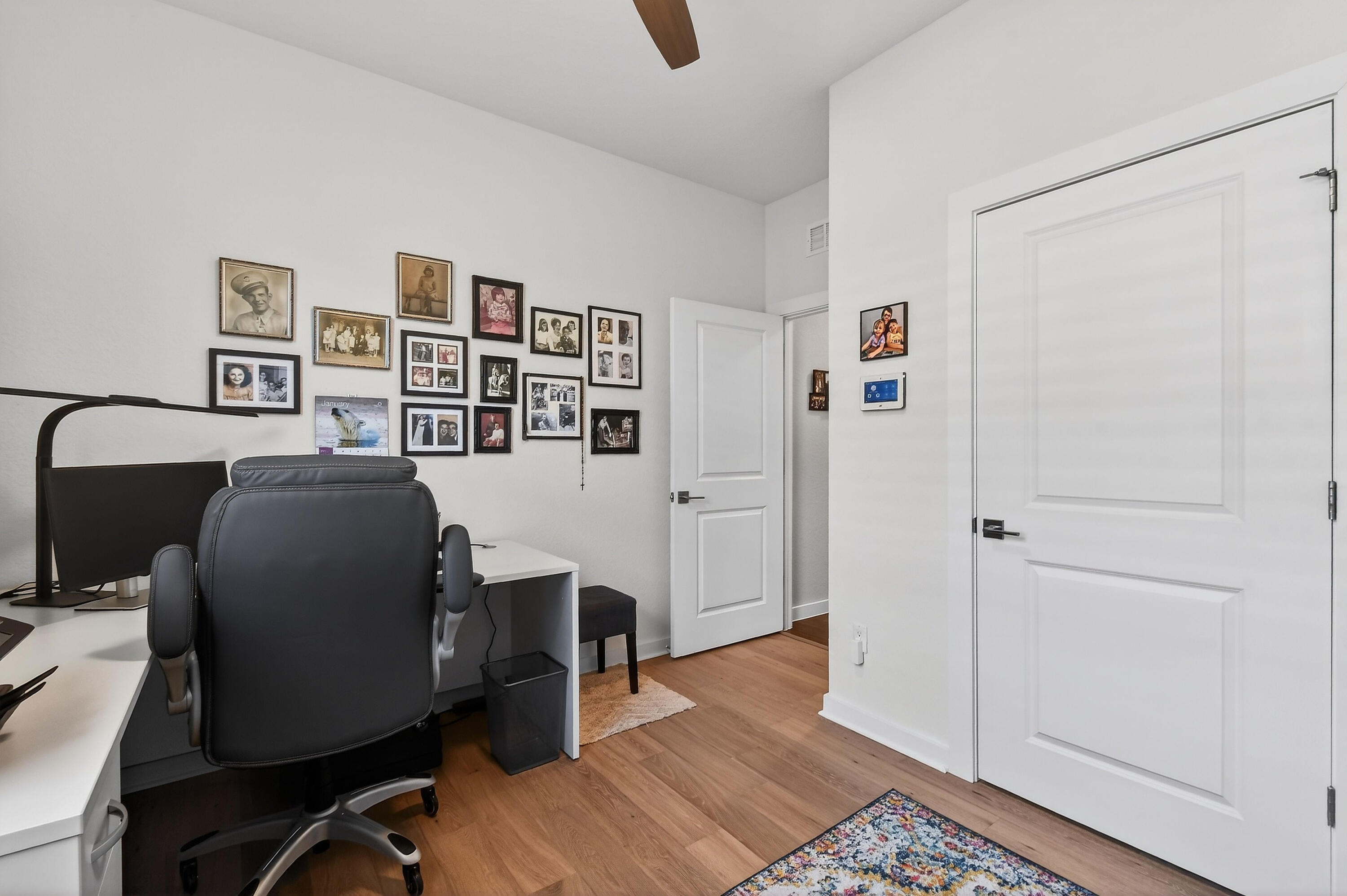 7561 Southwest Harbor Cove Drive Stuart, FL 34997 - Photo 46 of 62 a view of a workspace with furniture and wooden floor