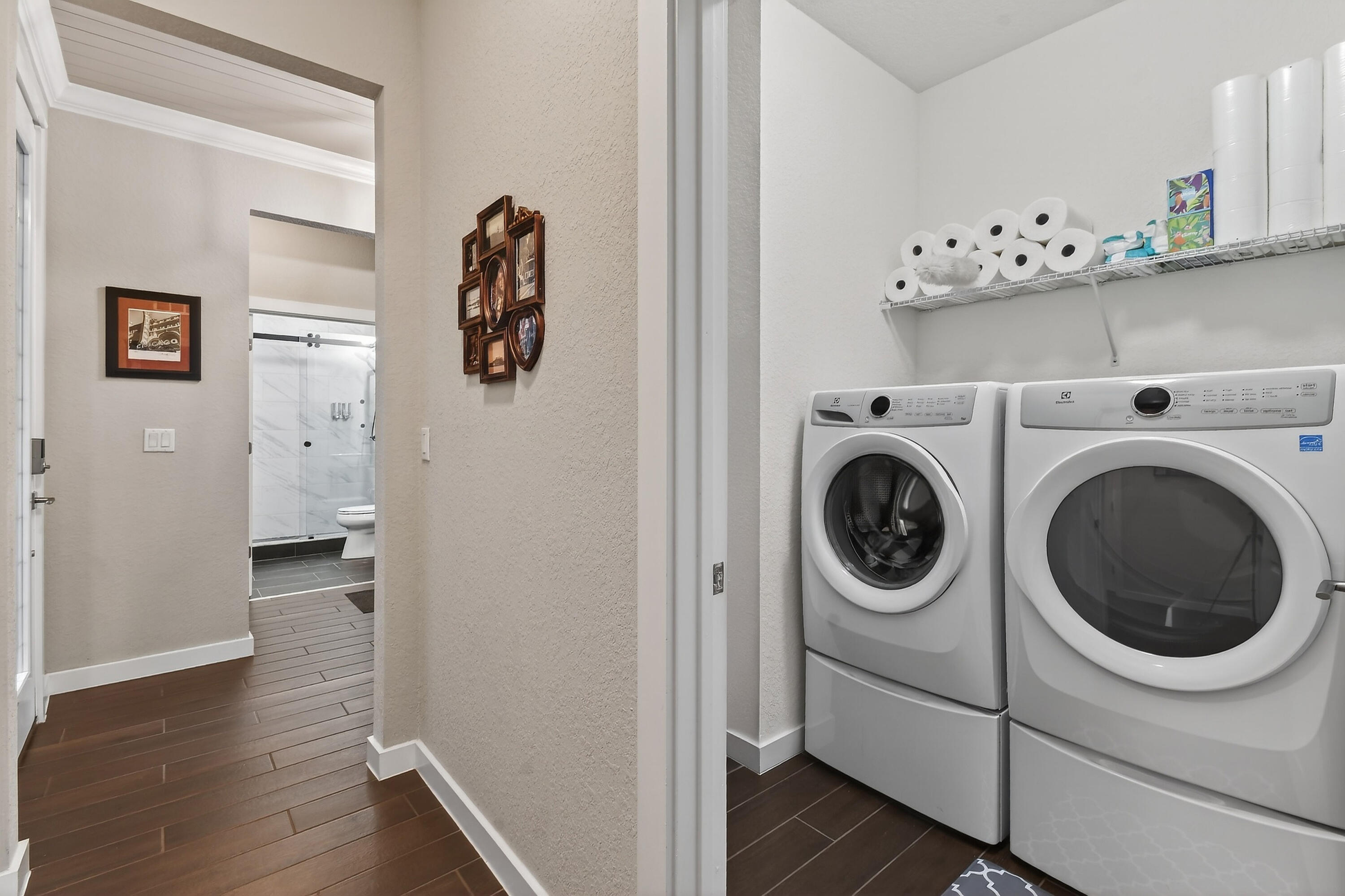 7561 Southwest Harbor Cove Drive Stuart, FL 34997 - Photo 47 of 62 a view of hallway with washer and dryer