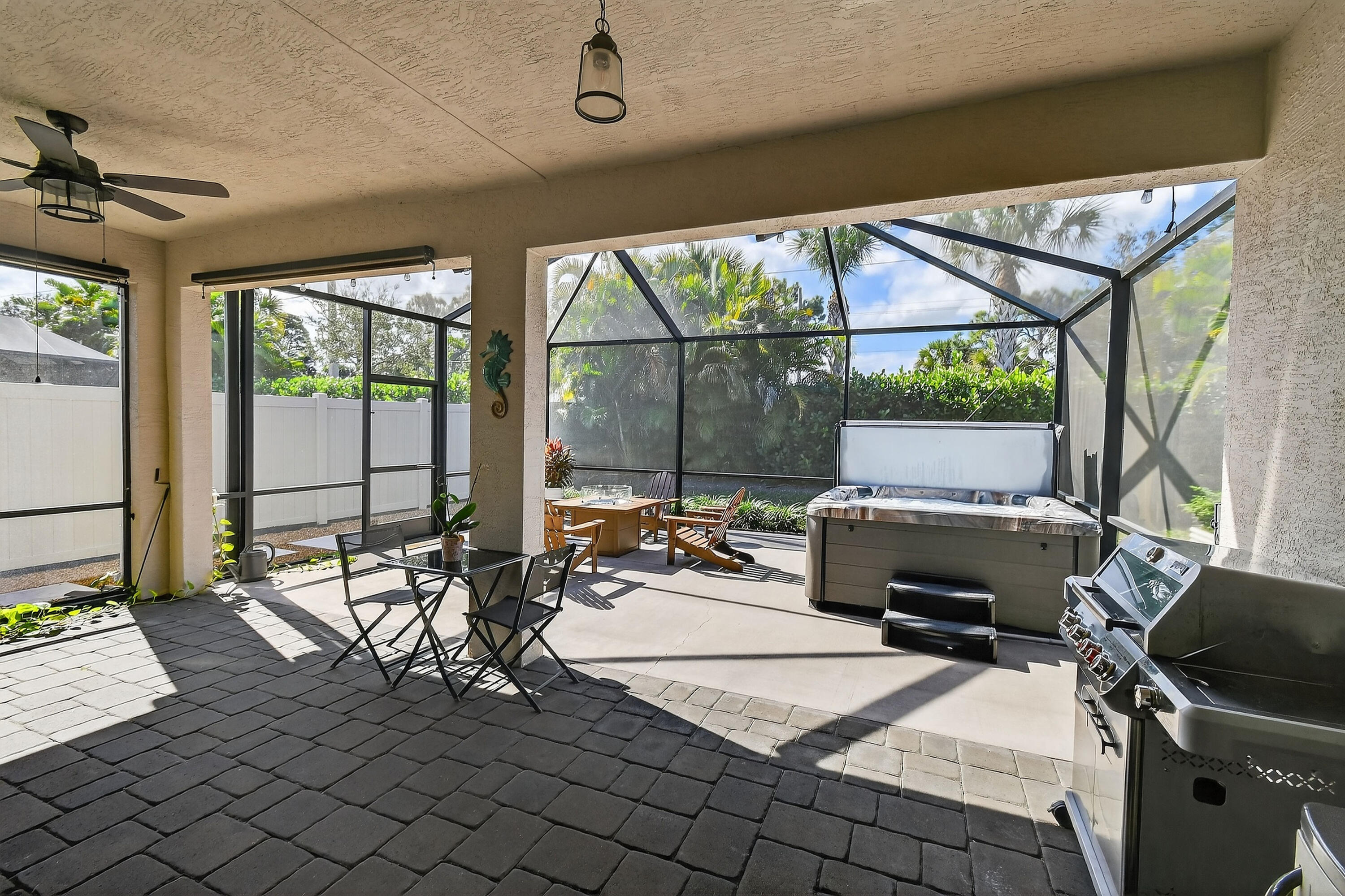 7561 Southwest Harbor Cove Drive Stuart, FL 34997 - Photo 49 of 62 a view of a workspace with furniture and windows