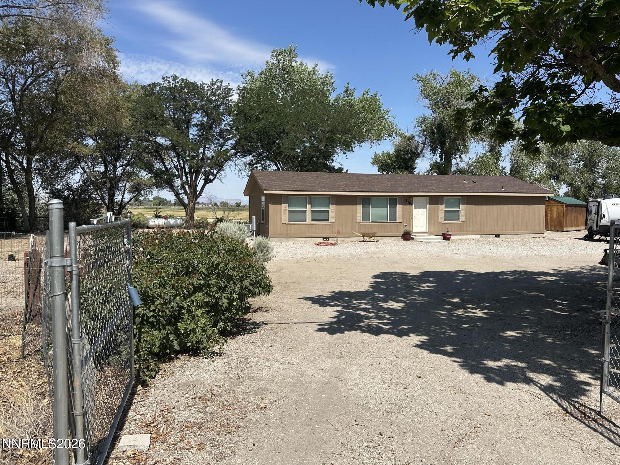 2195 Old River Road Fallon, NV 89406 - Photo 2 of 48 a view of a house with a yard