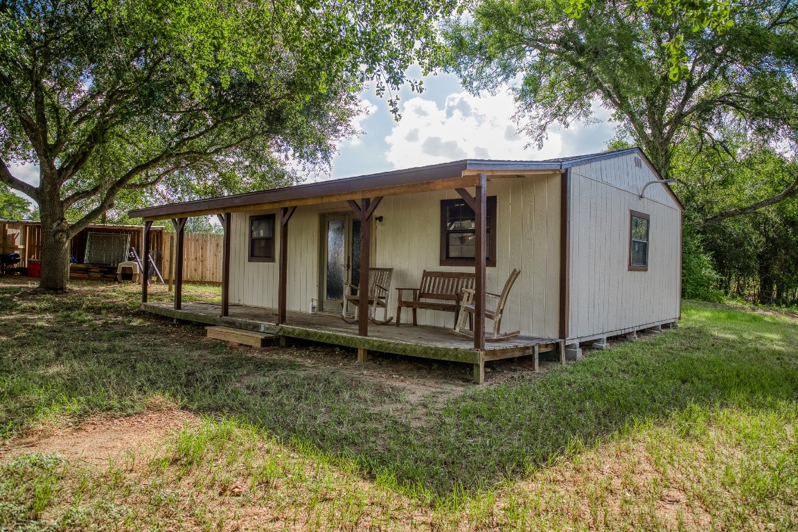 515 Highway 543 Loop West Point, TX 78963 - Photo 8 of 37 a view of a small house with a yard